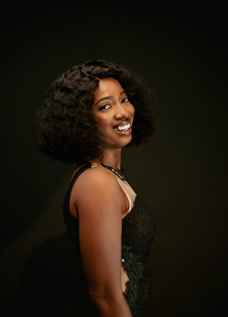 Smiling woman with curly hair