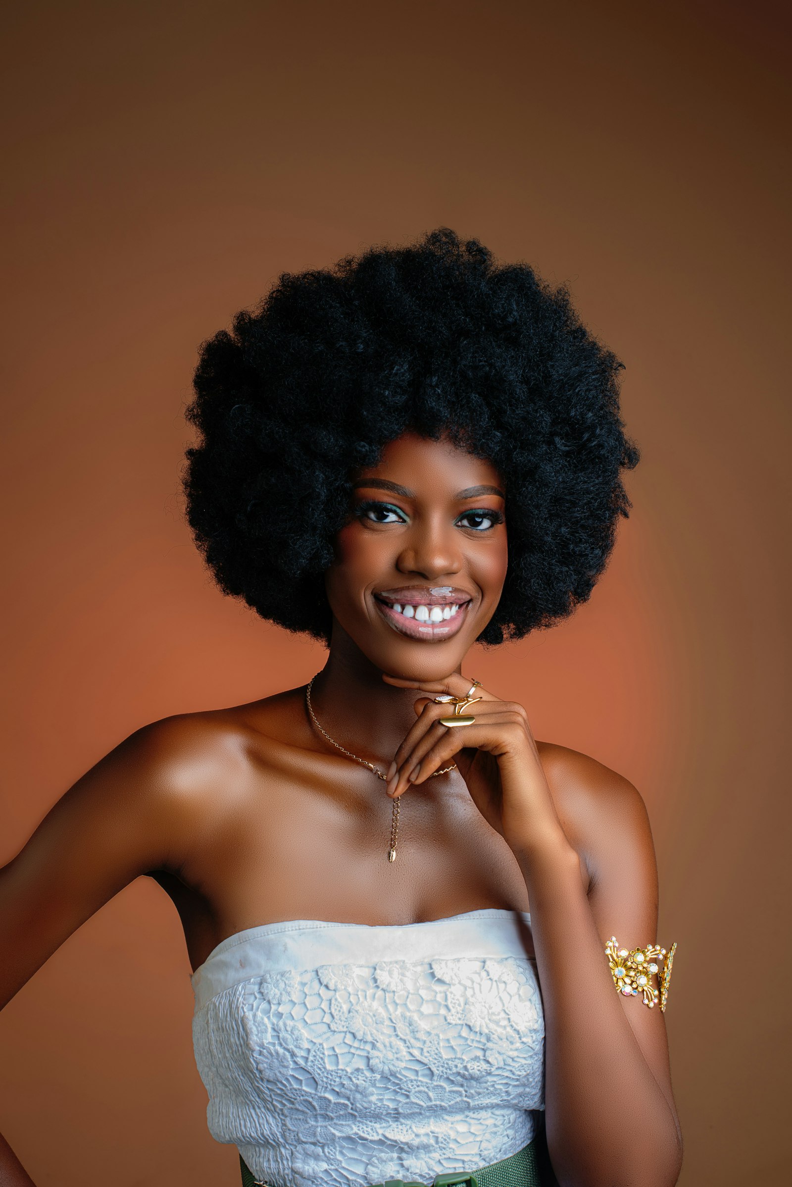 Woman with natural afro hair smiling